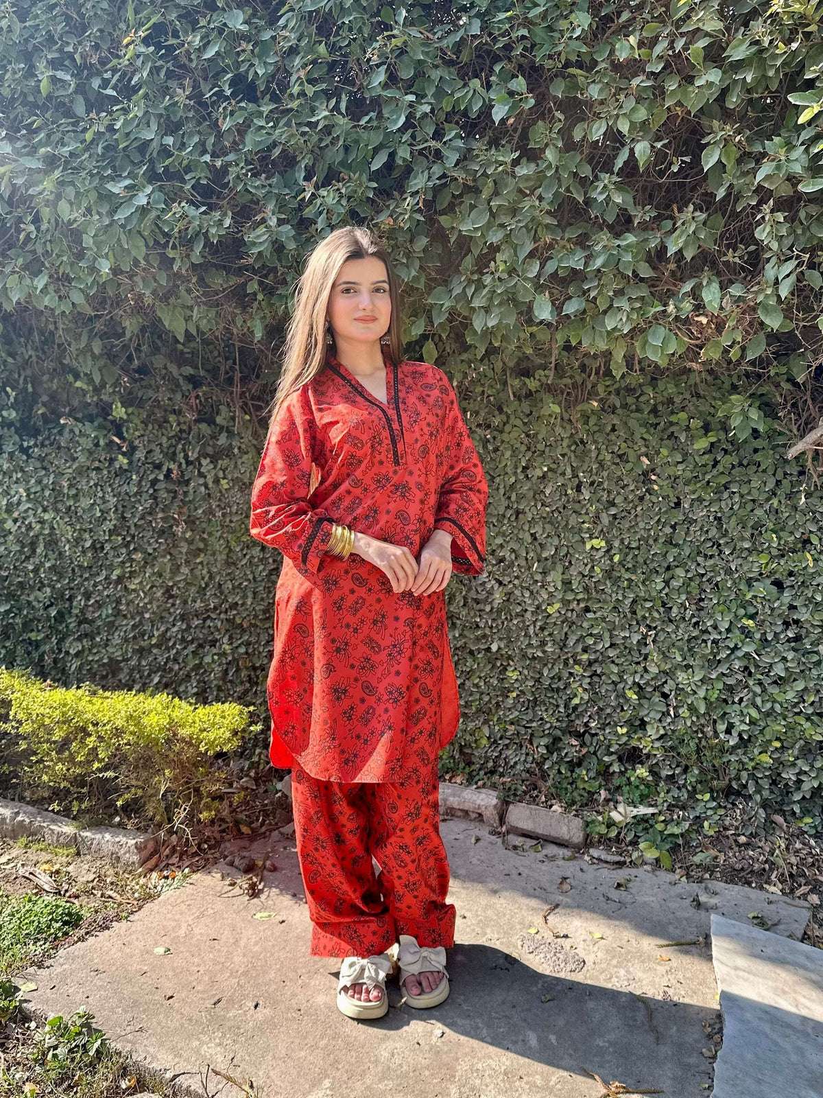 Zar Rust premium summer outfit for women featuring a rich rust base with bold black print on Arabic lawn fabric.