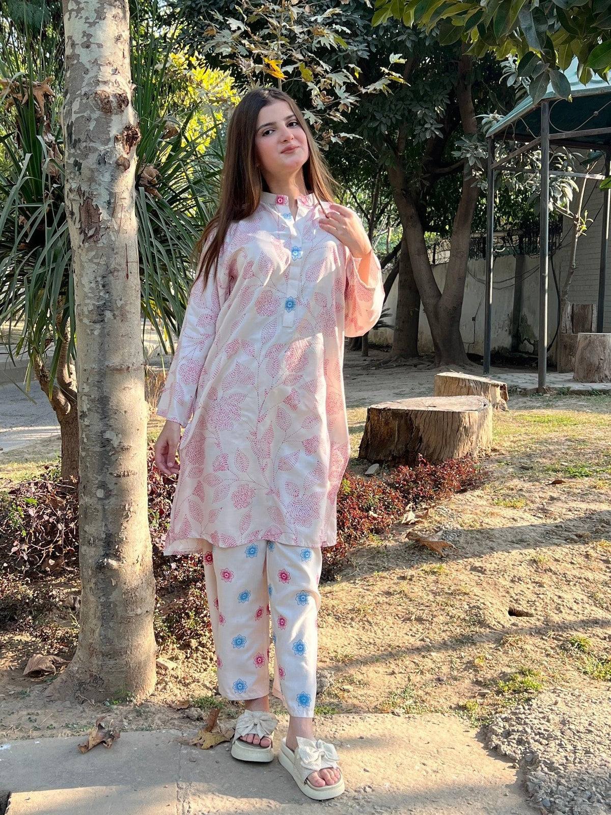 Mehak graceful off-white 2-piece premium Arabic lawn suit for women featuring a beautifully tailored top and Farshi Shalwar.
