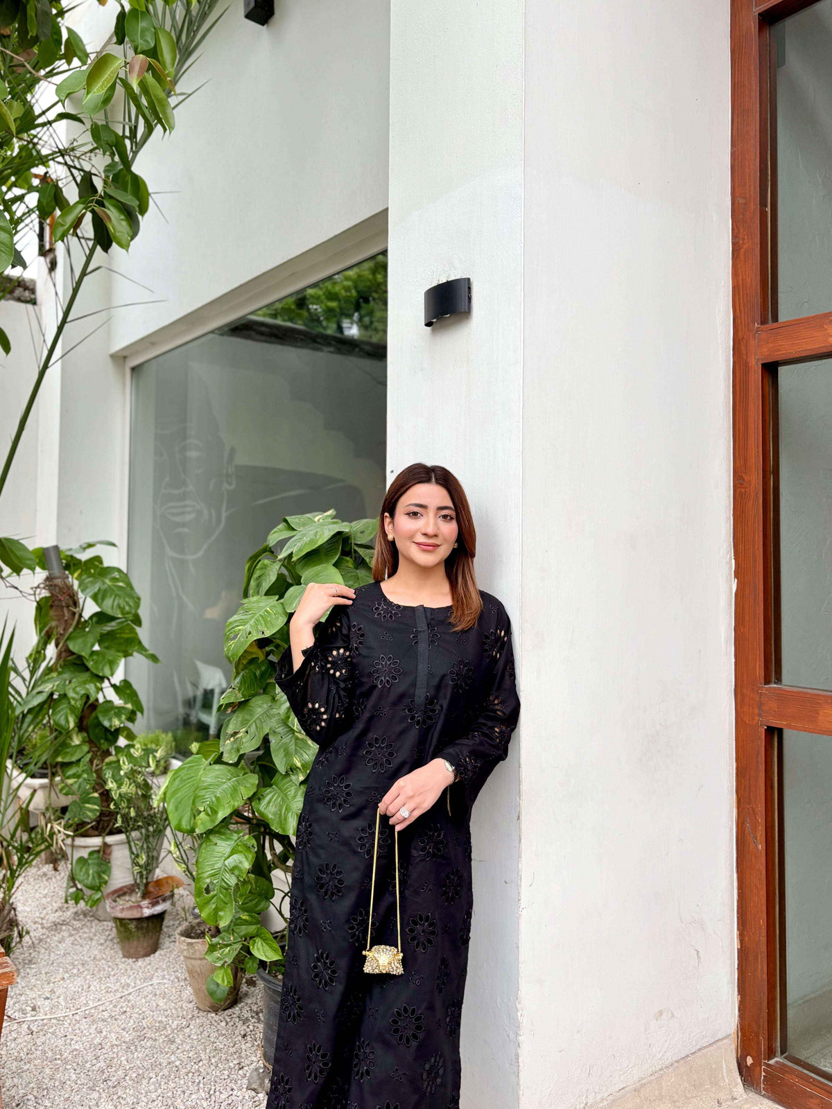 Zehra black 2-piece embroidered lawn suit featuring Chikankari-style patterns by Cloothy.
