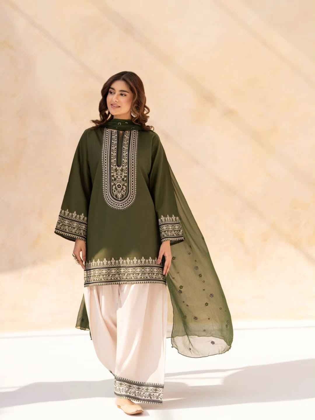 Roshni 2-piece embroidered lawn suit in deep green with intricate neckline detailing by Cloothy.