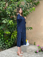 Side profile of the Cloothy Gulzar blue suit set featuring lightweight and breathable Arabic lawn fabric.