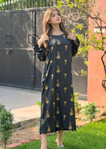 Full-length view of the Noorah midi-length linen outfit designed for a soft yet statement look.