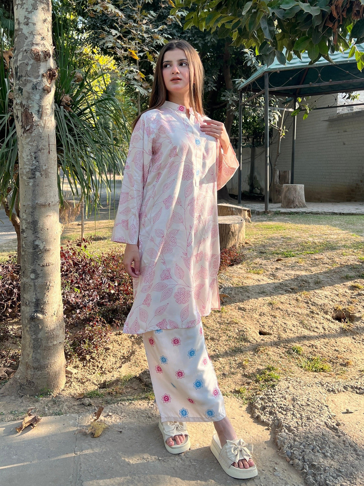 Mehak graceful off-white 2-piece premium Arabic lawn suit for women featuring a beautifully tailored top and Farshi Shalwar.