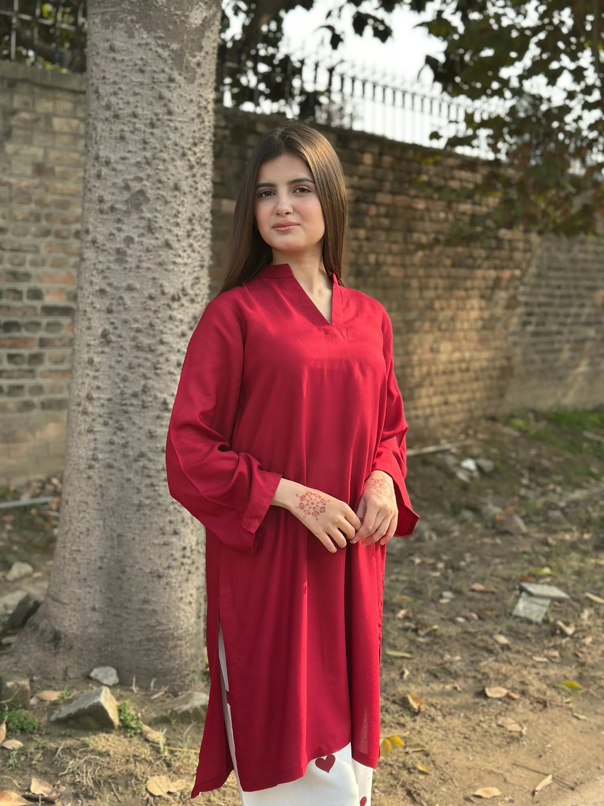 Close-up of the solid dyed finish and airy texture on the Scarlet Grace premium linen kurti.