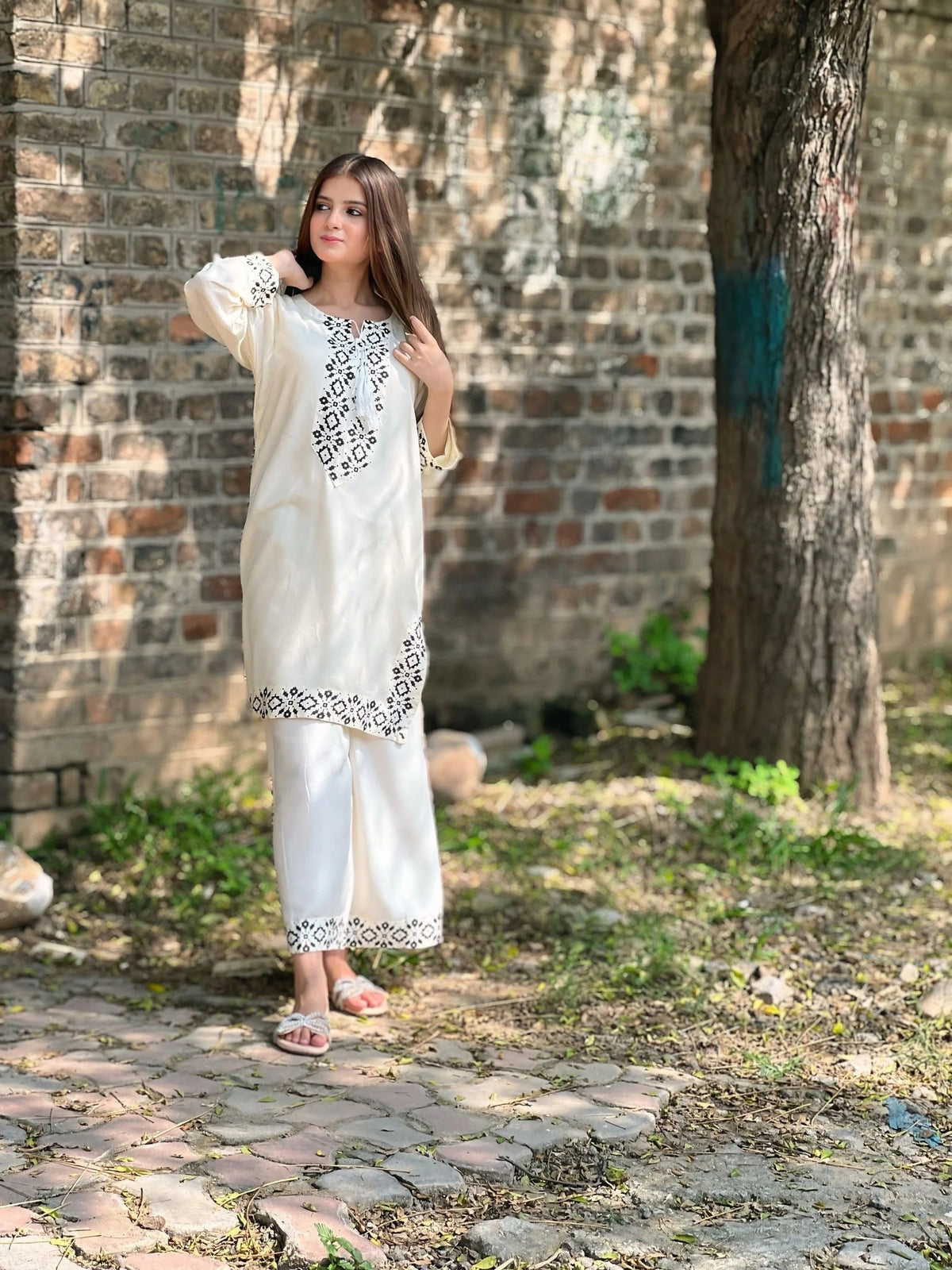 Full-length view of the Teteis cream suit set with matching Farshi Shalwar, designed for festive and casual wear.
